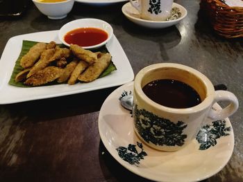 Close-up of breakfast on table