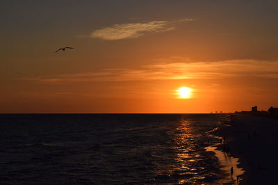 View of calm sea at sunset