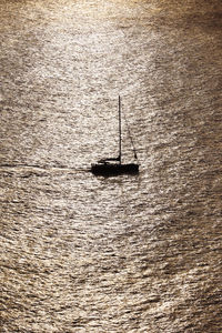 High angle view of sailboat sailing on sea