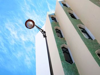 Low angle view of street light against sky