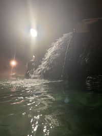 Scenic view of sea against sky at night