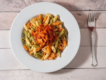 High angle view of pasta in plate on table