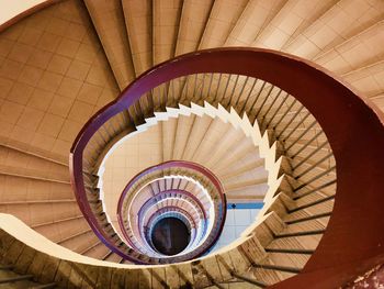 Directly below shot of spiral staircase in building