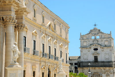 Low angle view of historical building against clear sky