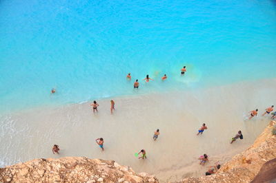 High angle view of people enjoying summer at porto katsiki beach