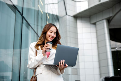 Young woman using digital tablet