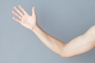 Midsection of woman against white background