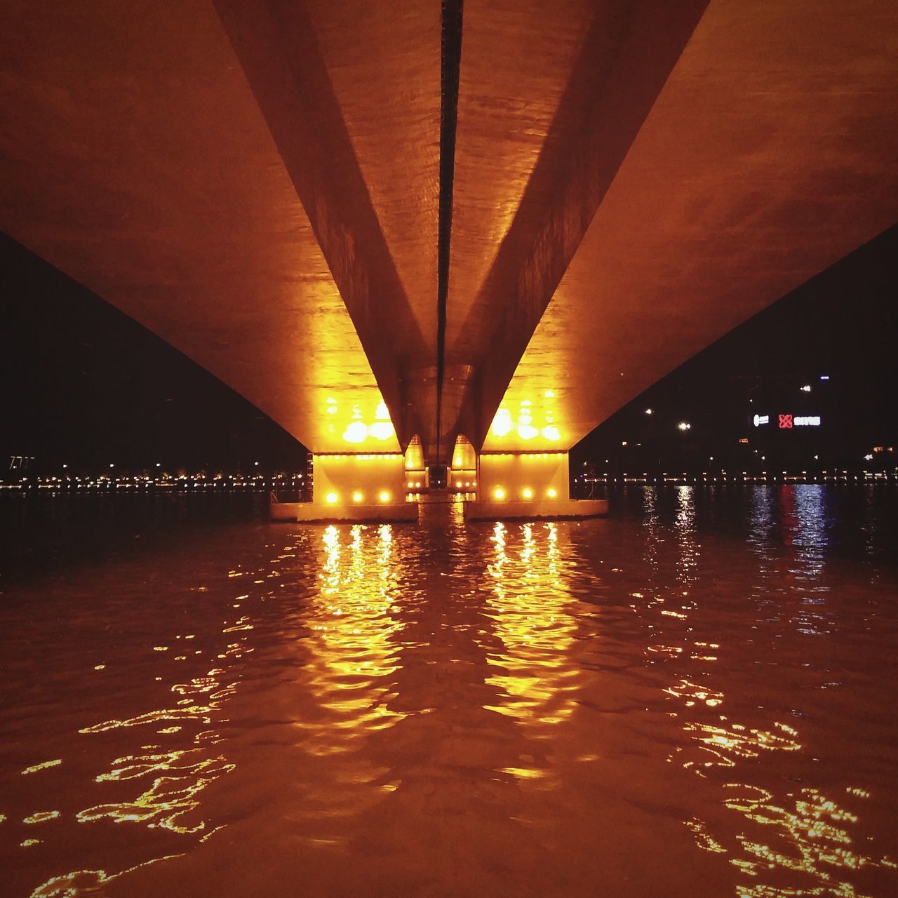 bridge - man made structure, connection, architecture, built structure, engineering, river, illuminated, underneath, below, sunset, water, transportation, no people, outdoors, night, under, city, sky