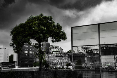 Low angle view of built structure against cloudy sky