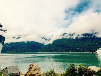 View of lake against cloudy sky