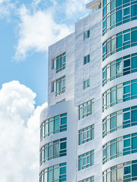 Arquitecture modern white building design with blue windows and the sky from puerto rico