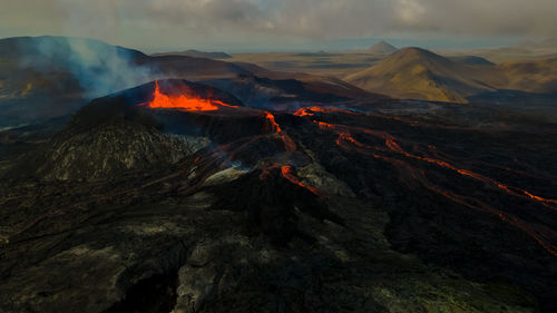 Scenic view of lava on mountain against sky