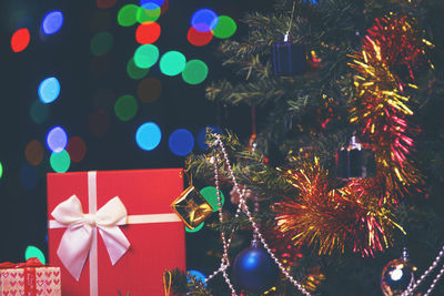 Close-up of christmas tree and presents