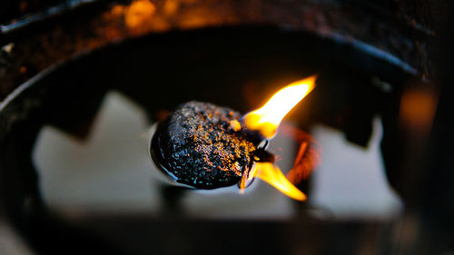 Close-up of burning candle