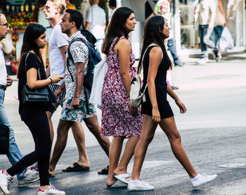 Group of people on street in city