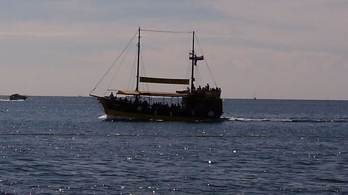 Ship on sea against sky