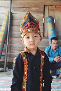 Little young man wearing clothes from the southeast aceh region