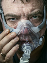 Portrait of man holding camera