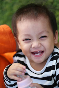 Portrait of cute boy smiling