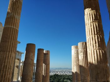 Low angle view of building against clear blue sky