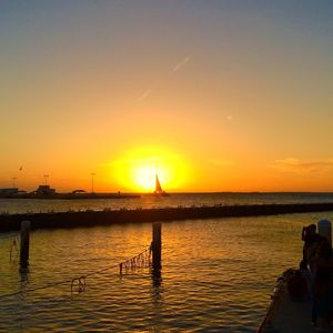 Scenic view of sea at sunset