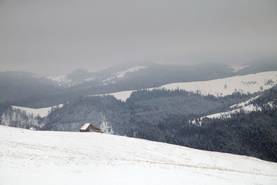 Scenic view of mountains against clear sky