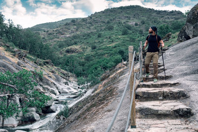 Rear view of man on mountains