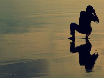 Reflection of people in water