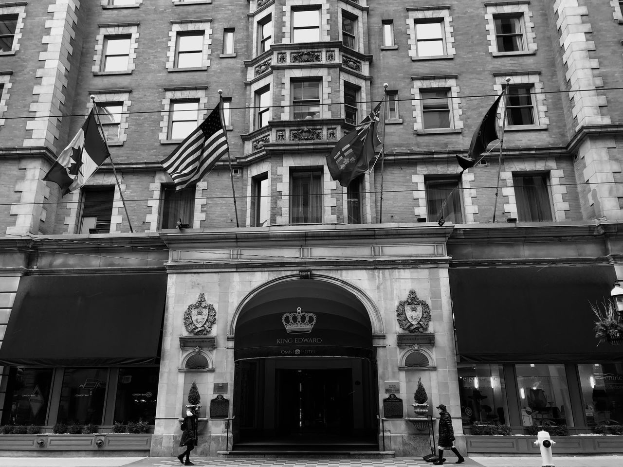 LOW ANGLE VIEW OF BUILDING AGAINST STREET