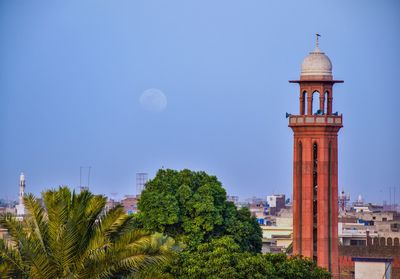 Lighthouse against blue sky