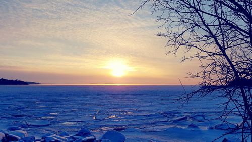 Scenic view of sunset over sea