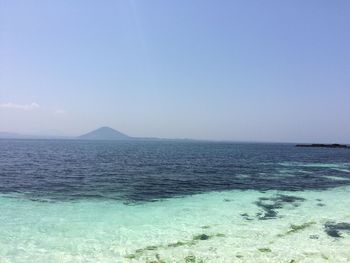 Scenic view of sea against clear sky