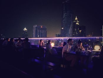 People in city at night