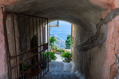 Sicilian alley overlooking the splendid blue sea
