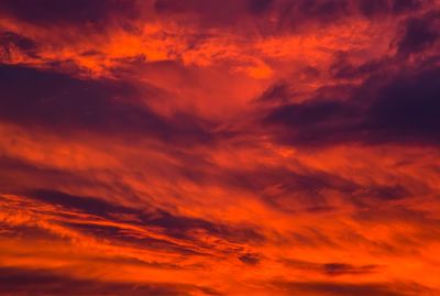 Low angle view of dramatic sky during sunset
