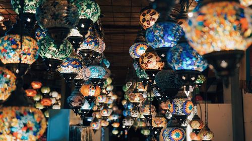 Low angle view of lanterns hanging for sale in store