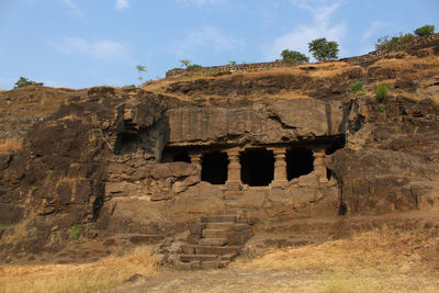 Old ruins of building against sky