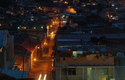 High angle view of illuminated houses