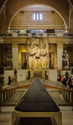 People in illuminated building