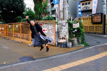 WOMAN WALKING ON STREET