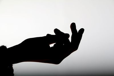 Silhouette of person standing in clear sky