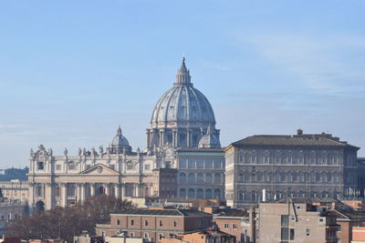 Buildings in city against sky