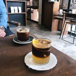 Glass of coffee on table