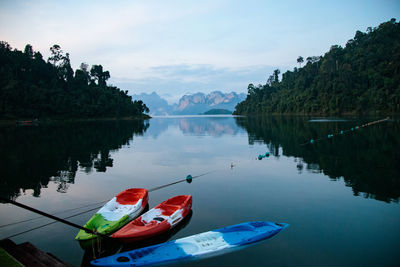 Boat in lake at ratchaprapa dam ,khao sok, surat thani province, thailand 