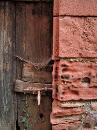 Close-up of weathered brick wall