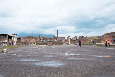 Group of people in front of historical building