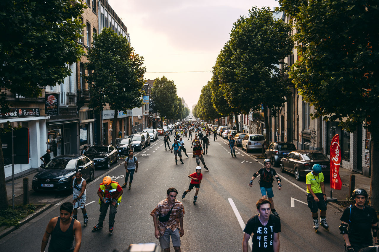 CROWD ON CITY STREET