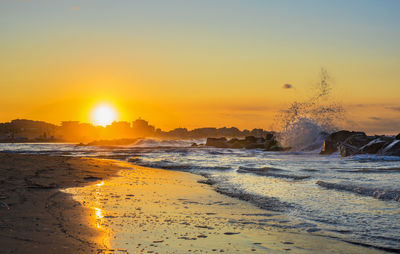 Scenic view of sea against sky during sunset