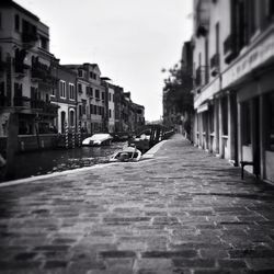 Surface level of narrow street in city