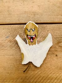 Close-up of bread on wooden table